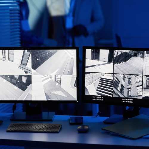 Computer screens with surveillance camera footage