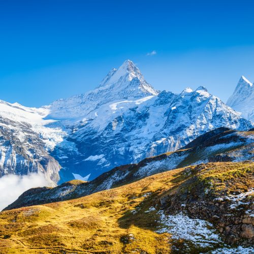 Mountain scenery in the Swiss Alps. Mountains peaks. Natural landscape. Mountain range and clear blu