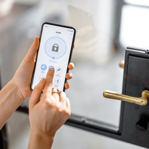 Smartphone with launched application for alarm security